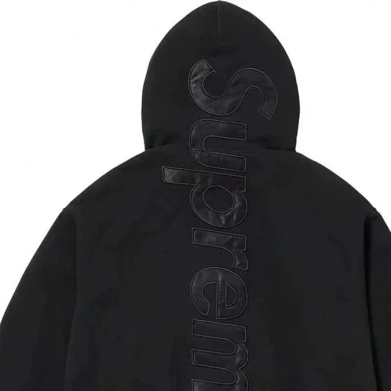 Black with black lettering (large letters on the back)